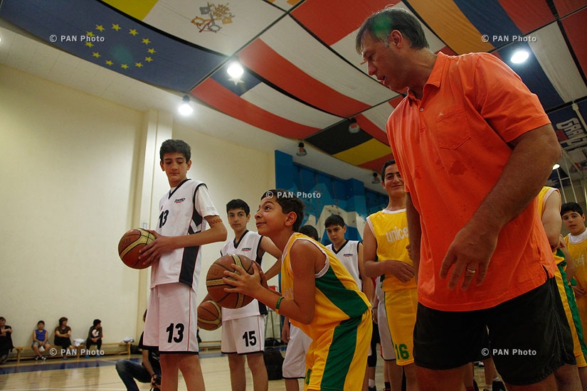 Legendary Lithuanian basketball player Sarunas Marciulionis holds a master-class for about 120 children