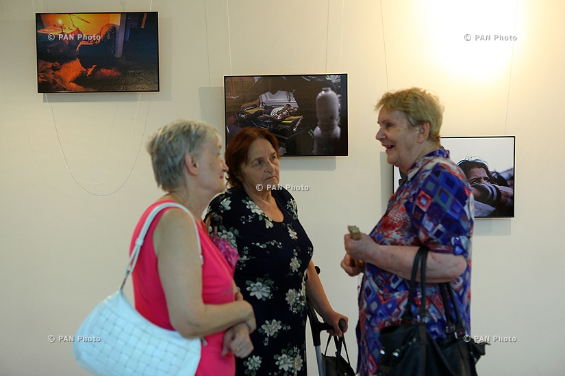  Photo exhibition in support of claim to exemption photographer MIA  Russia today  Andrew Stenin