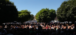 Trade fair employees protest near government building