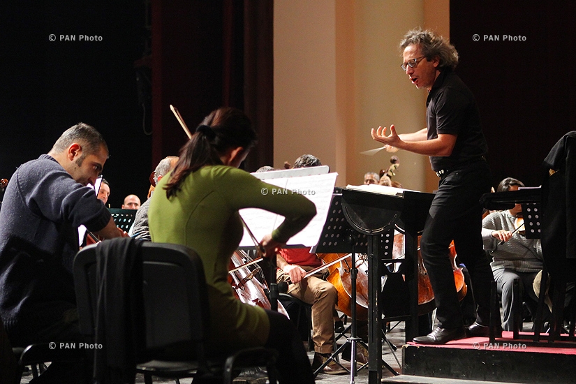 Concert rehearsal of conductor and violinist George Pehlivanian