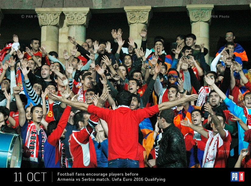 Football fans encourage players before Armenia vs Serbia match. Uefa Euro 2016 Qualifying. Yerevan, Armenia