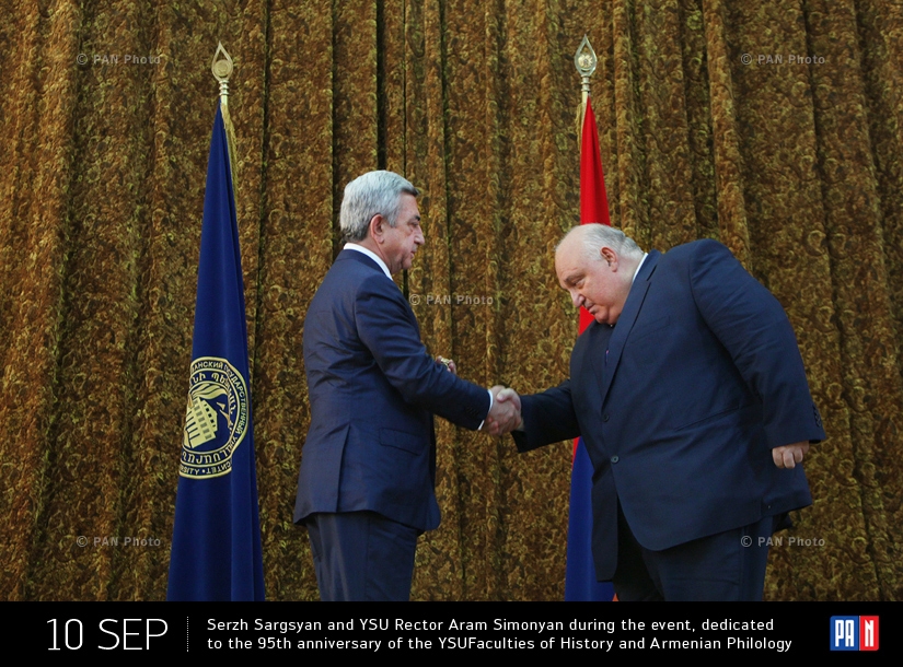 Armenian President Serzh Sargsyan shakes hands  with  YSU Rector Aram Simonyan during the event, dedicated to the 95th anniversary of the YSU Faculties of History and Armenian Philology. Yerevan, Armenia