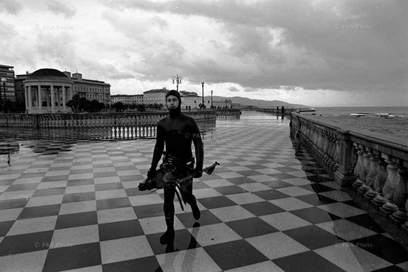 A  diver at one of the squares of Livorno, where Fellini's famous 8½  film's orchestra scene was shot   