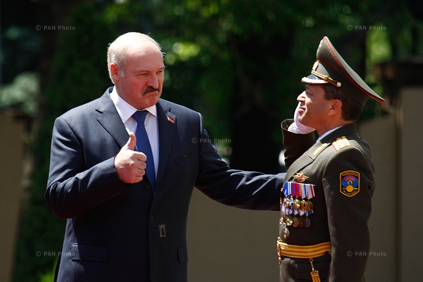 Belarusian President Alexander Lukashenko gives a thumbs up during the official welcoming ceremony in Yerevan, Armenia