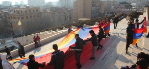 Activists take photos with Armenian flag to protest filming ban at Cascade