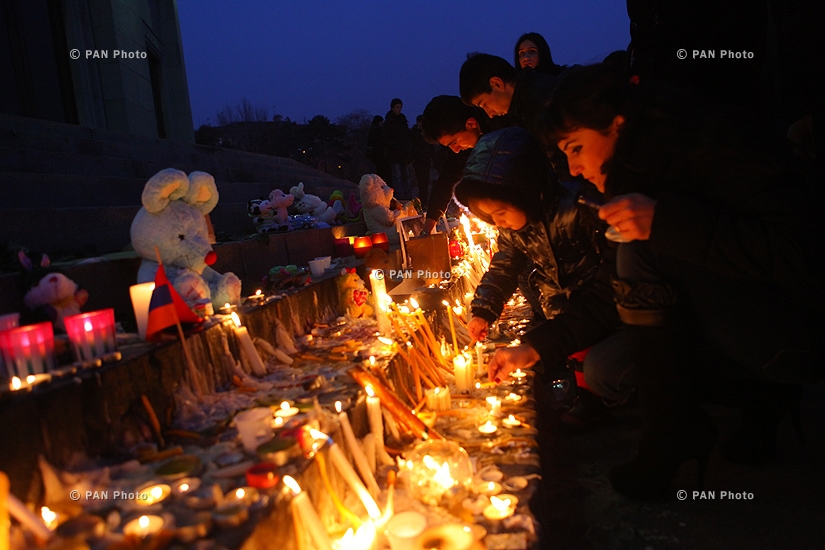 Candle lighting in memory of 6-month-old Seryozha Avetisyan in Liberty Square