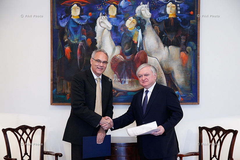 Germany's newly appointed Ambassador to Armenia Matthias Kiesler hands copies of his credentials to RA Minister of Foreign Affairs Edward Nalbandyan