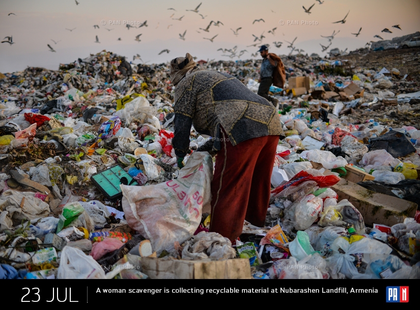 A woman scavenger is collecting recyclable material at Nubarashen Landfill, Armenia