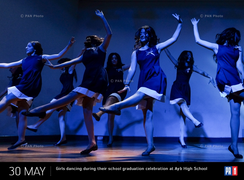 Girls dancing during their school graduation celebration at Ayb High School