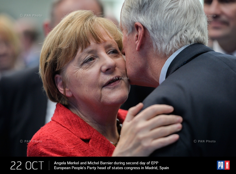  German Federal Chancellor Angela Merkel and Member of European Parliament (MEP) Michel Barnier during second day of EPP European People's Party head of states congress in Madrid, Spain