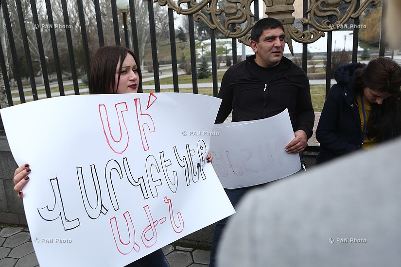 Journalists protest against Republican MP Mher Sedrakyan near the building of Armenian National Assembly