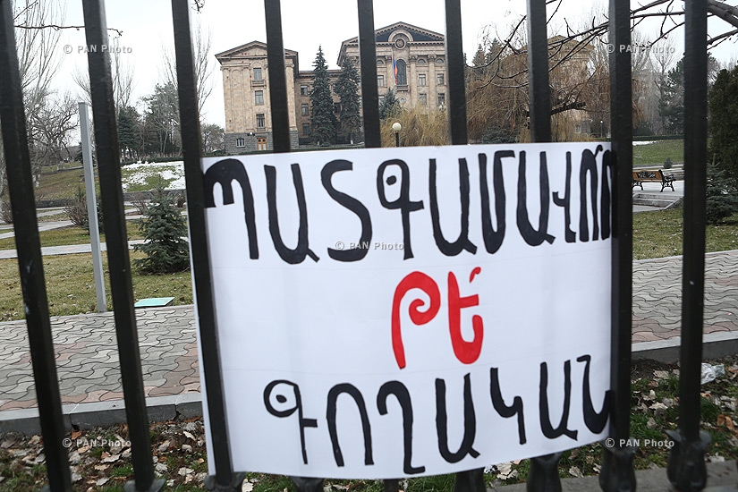 Journalists protest against Republican MP Mher Sedrakyan near the building of Armenian National Assembly