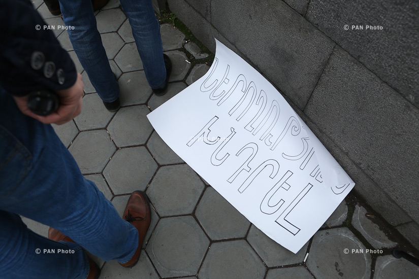 Journalists protest against Republican MP Mher Sedrakyan near the building of Armenian National Assembly