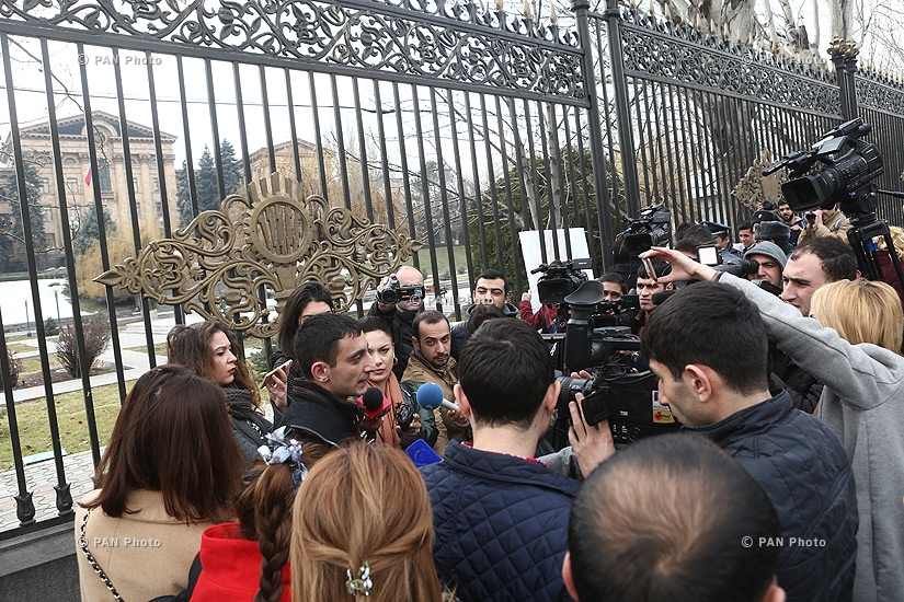 Journalists protest against Republican MP Mher Sedrakyan near the building of Armenian National Assembly