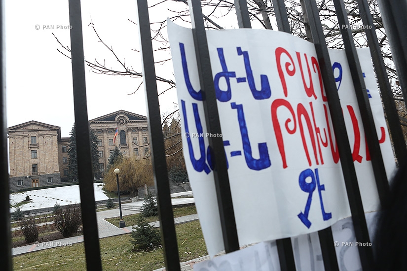 Journalists protest against Republican MP Mher Sedrakyan near the building of Armenian National Assembly
