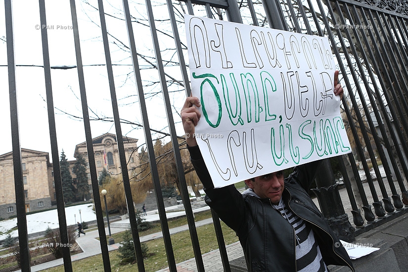 Journalists protest against Republican MP Mher Sedrakyan near the building of Armenian National Assembly