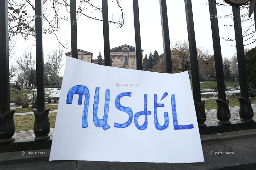 Journalists protest against Republican MP Mher Sedrakyan near the building of Armenian National Assembly
