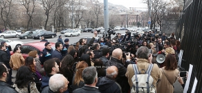 Journalists protest against Republican MP Mher Sedrakyan near the building of Armenian National Assembly