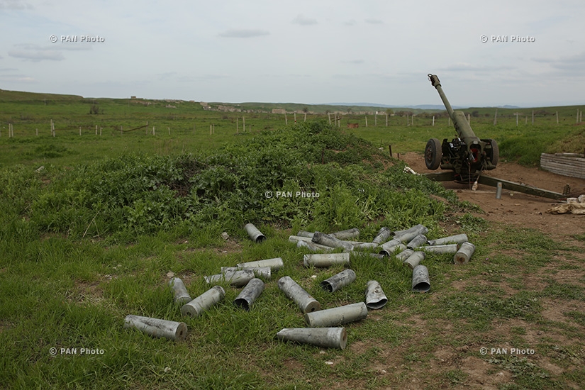 A D-30 howitzer and its cartridge cases in the southeastern section of the Nagorno Karabakh-Azerbaijan contact line