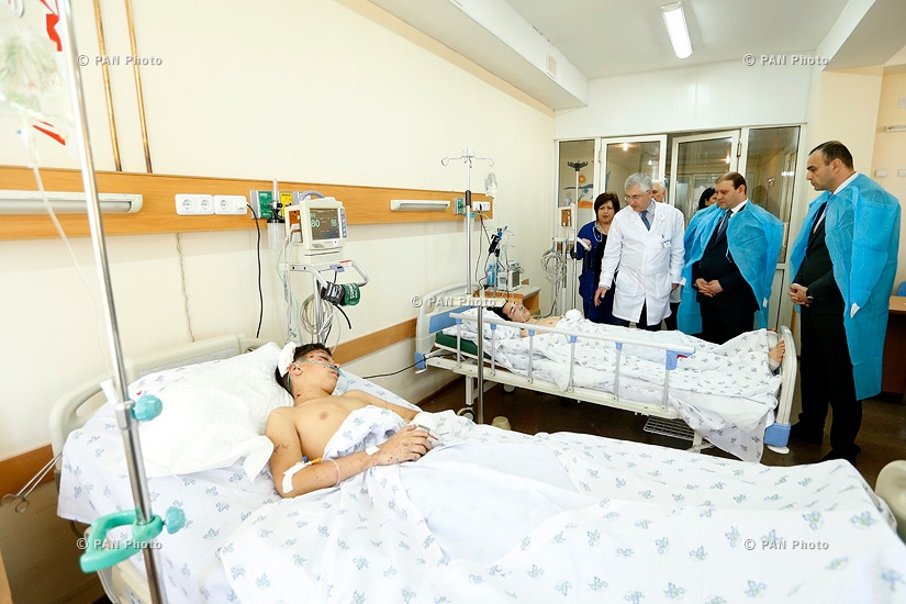 The two teens - Edgar Gasparyan and Roland Khojoyan - injured in a bus explosion, in Surb Astvatsamayr medical center in Yerevan