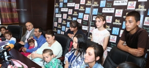 Press conference by the Melkonyan family with 14 children, UNFPA Armenia Country Program representative Garik Hayrapetyan and singer and single mother Alla Navasardyan