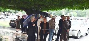 Residents  of Yerevan's 33rd district of Firdusi protest in front of government building