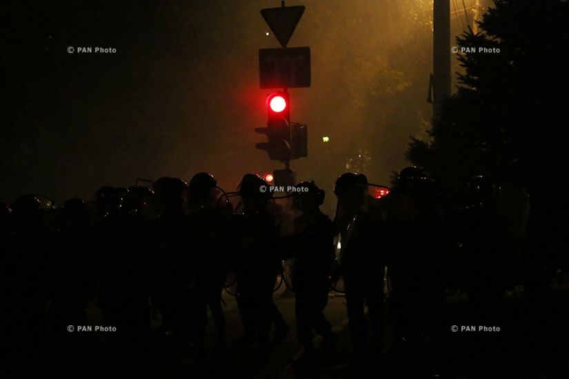 Tear gas fired, clashes between police and protesters near Yerevan's seized police department