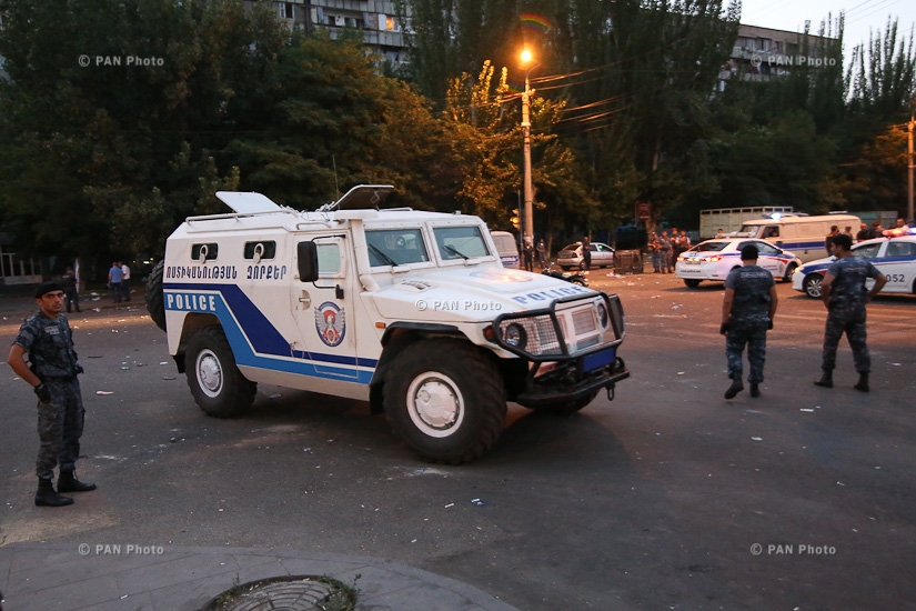 Police detain protesters outside seized patrol regiment in Yerevan