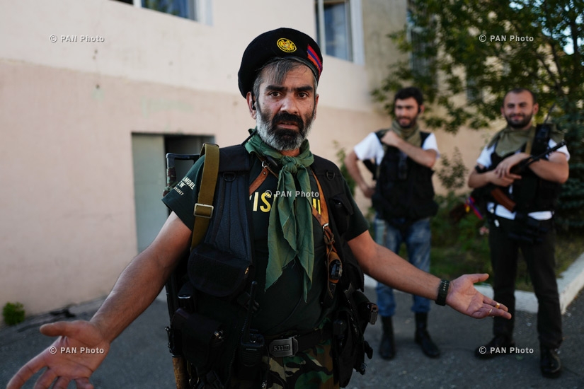 Members of Sasna Tsrer group in the territory of seized patrol department in Yerevan