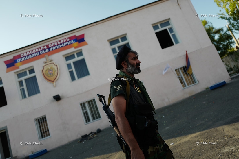 Members of Sasna Tsrer group in the territory of seized patrol department in Yerevan