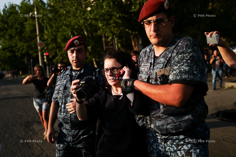 Police detain protesters outside seized patrol regiment in Yerevan. Day 11