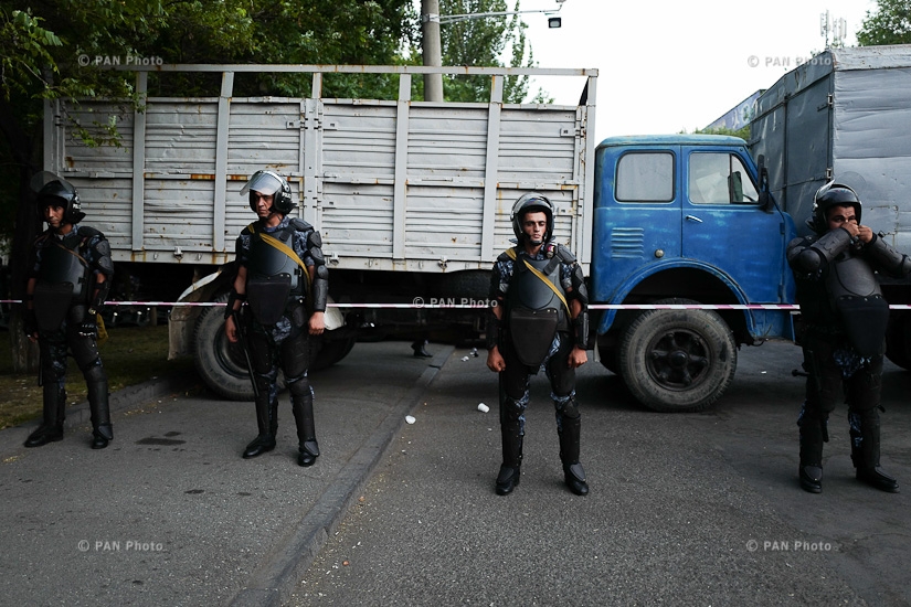 Police detain protesters outside seized patrol regiment in Yerevan. Day 11