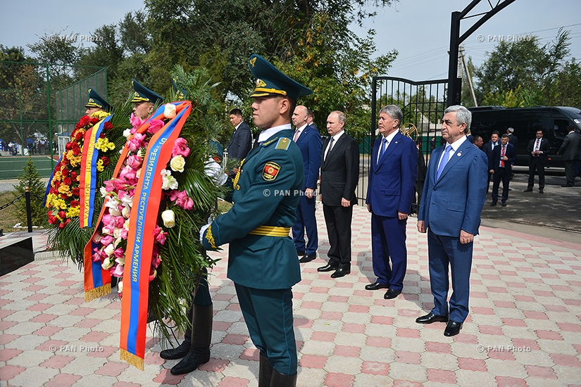 Armenian, Russian and Kyrgyz Presidents Serzh Sargsyan, Vladimir Putin and Almazbek Atambayev lay flowers in memory of Great Patriotic War victims in Arashan, Kyrgyzstan