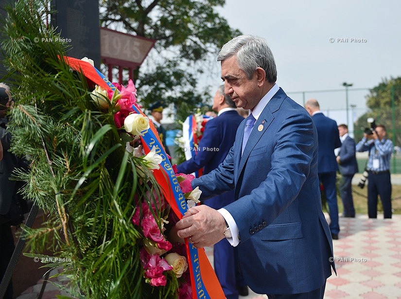 Armenian, Russian and Kyrgyz Presidents Serzh Sargsyan, Vladimir Putin and Almazbek Atambayev lay flowers in memory of Great Patriotic War victims in Arashan, Kyrgyzstan